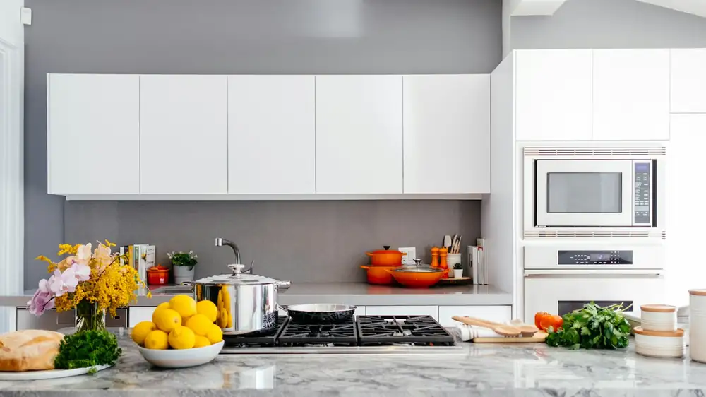 A kitchen unpacked and measured before any container was bought